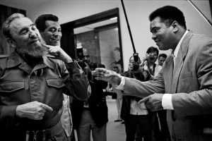 Fidel Castro jokes with Muhammad Ali as Teofilo Stevenson looks on. Havana, Cuba, 1996