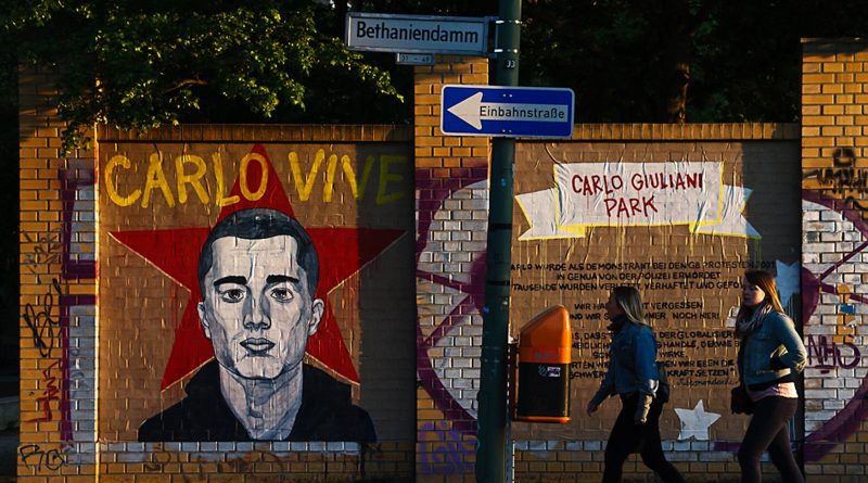 Wand-Graffiti mit Gesicht von Carlo Guiliani und Spruch Carlo Vive in Berlin